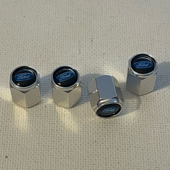 Ford valve Stem caps in Silver set of 4 NWT - Picture 1 of 4